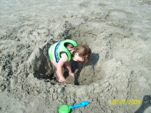 Chloe was determined that she was a pirate and that there was a treasure somewhere in that hole!